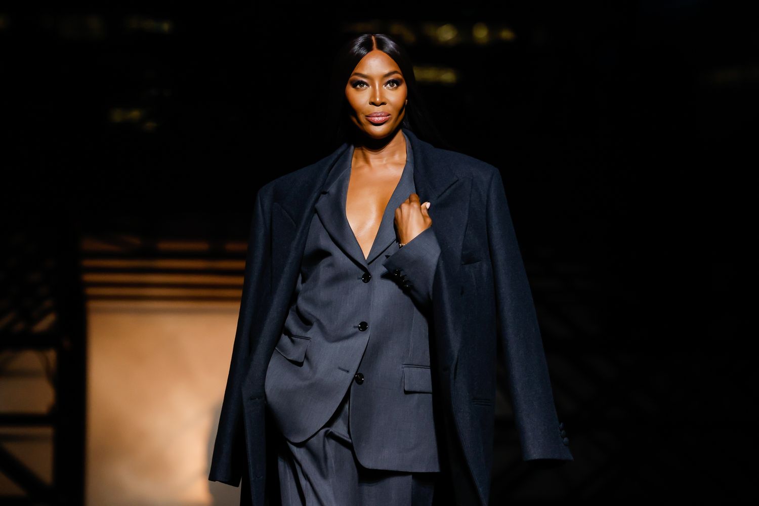 Naomi Campbell walks the runway at the Boss show during the Milan Fashion Week.